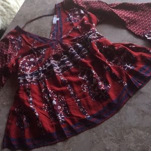 Boho bell sleeved v neck and back umpire waist top